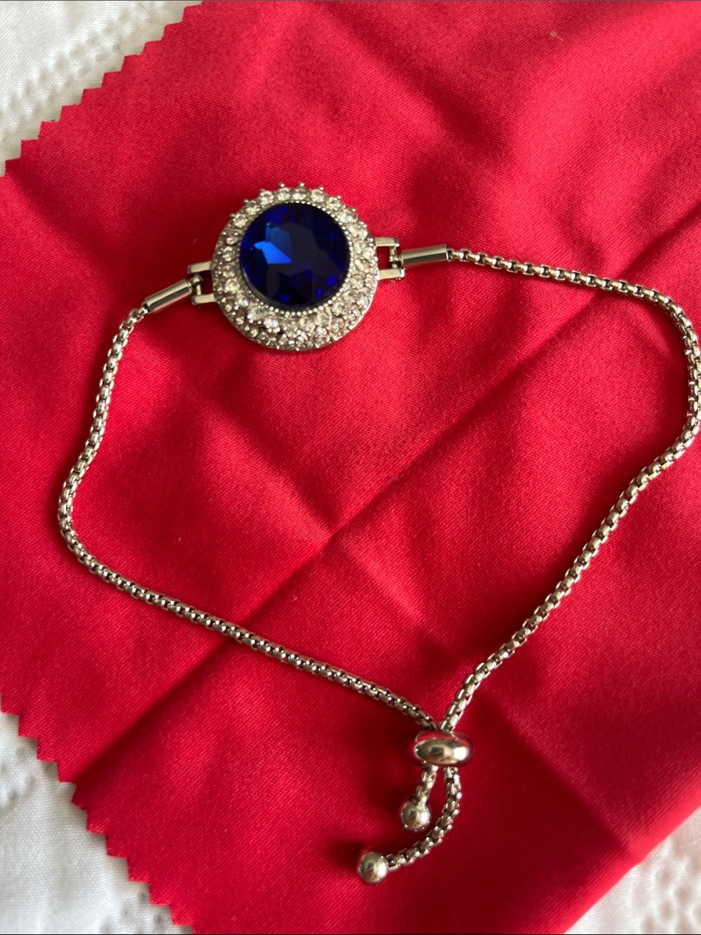 Silver Bracelet with Sapphire-Blue Center and Clear Accents